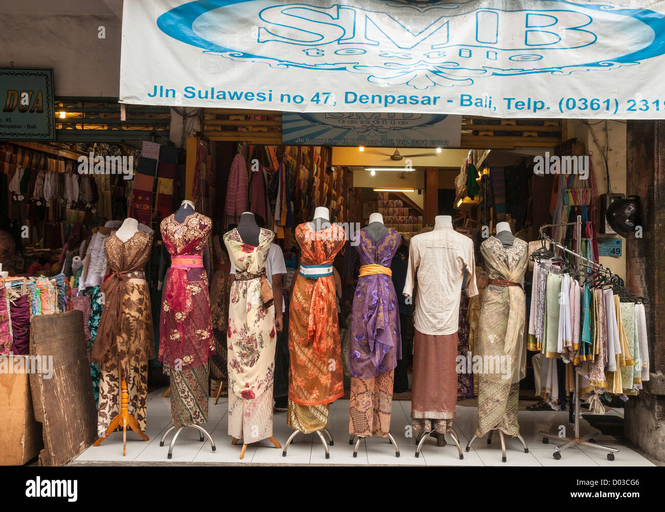 Shops dealing in traditional textiles in Sulawesi Street, Denpasar,  Southern Bali, Indonesia Stock Photo - Alamy