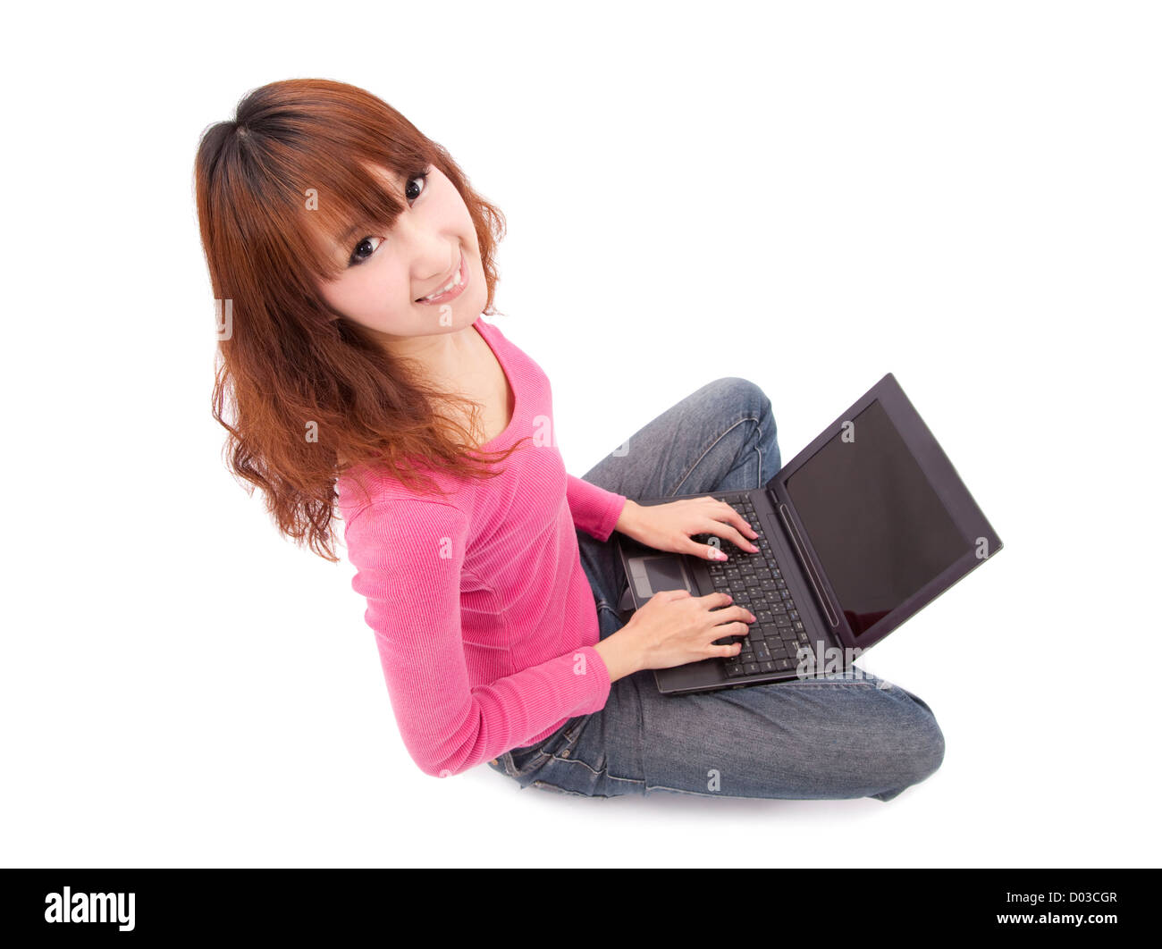 Asian young woman sitting on floor with a laptop Stock Photo - Alamy