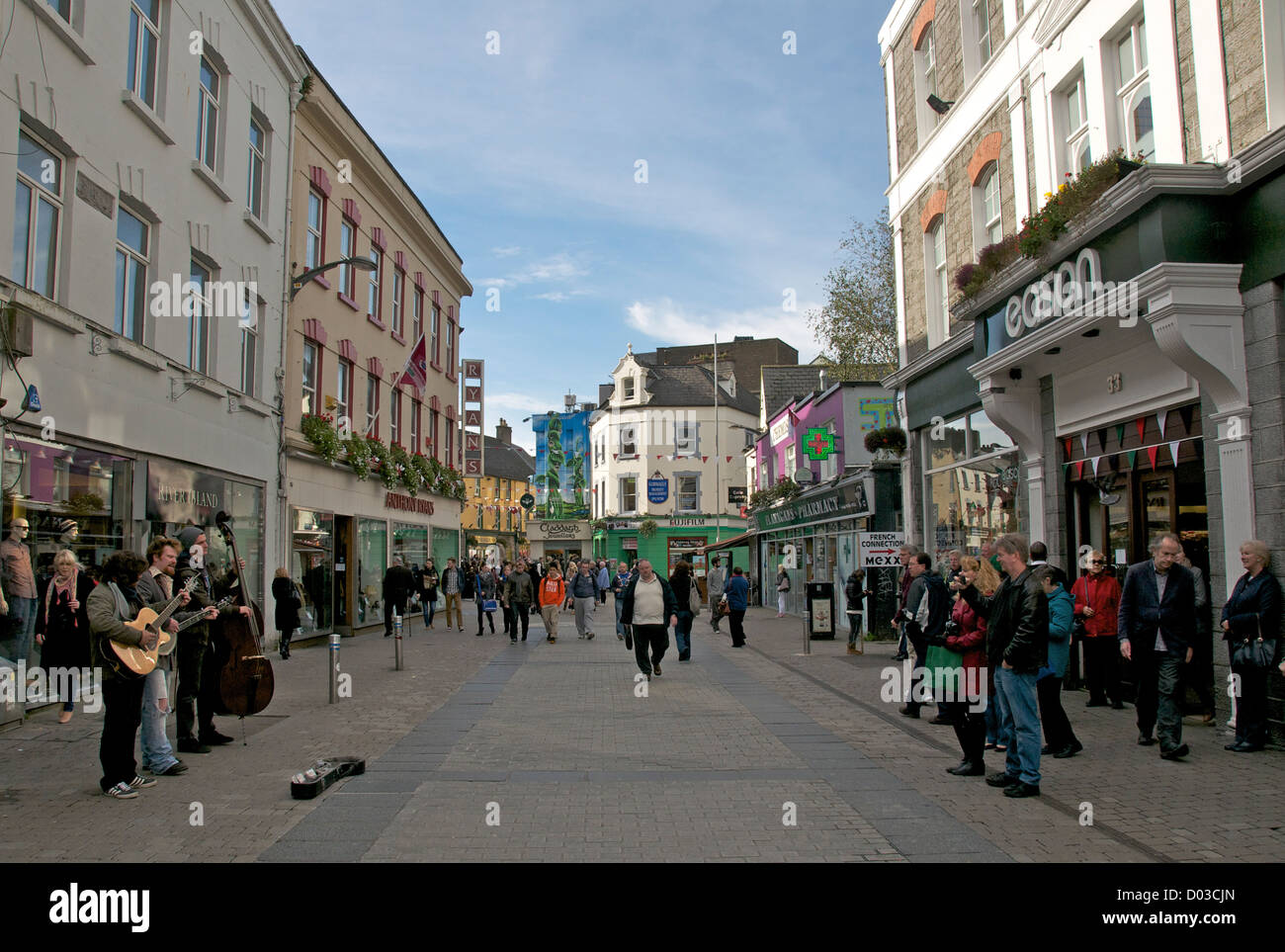 Buskers playing in pedestrian street Galway County Galway Ireland Stock Photo