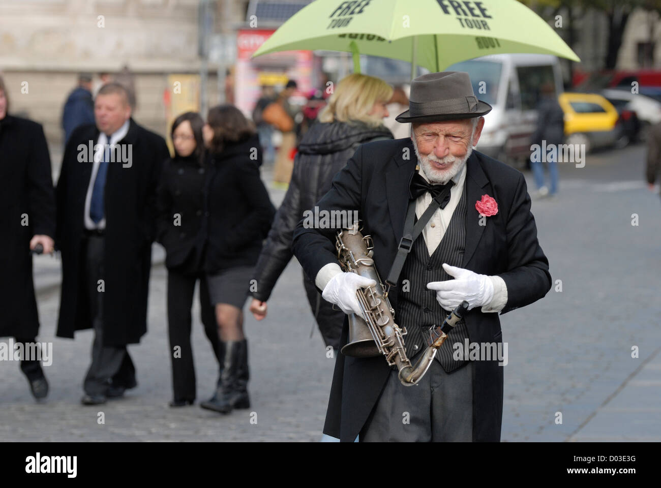 Prague, Czech Republic. Musician playing the saxophone in Old Town