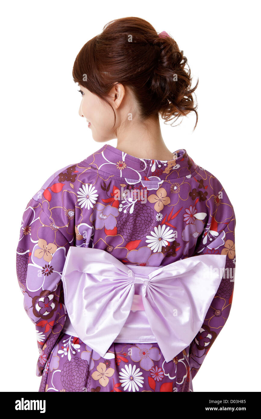 Japanese elegant woman in traditional clothes, kimono, closeup portrait of back view. Stock Photo