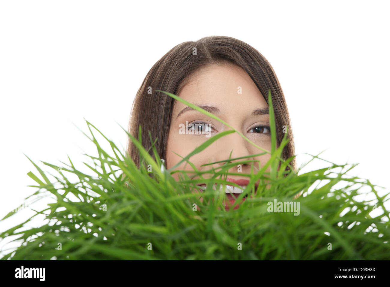 Beautiful young woman relaxing in the grass Stock Photo - Alamy