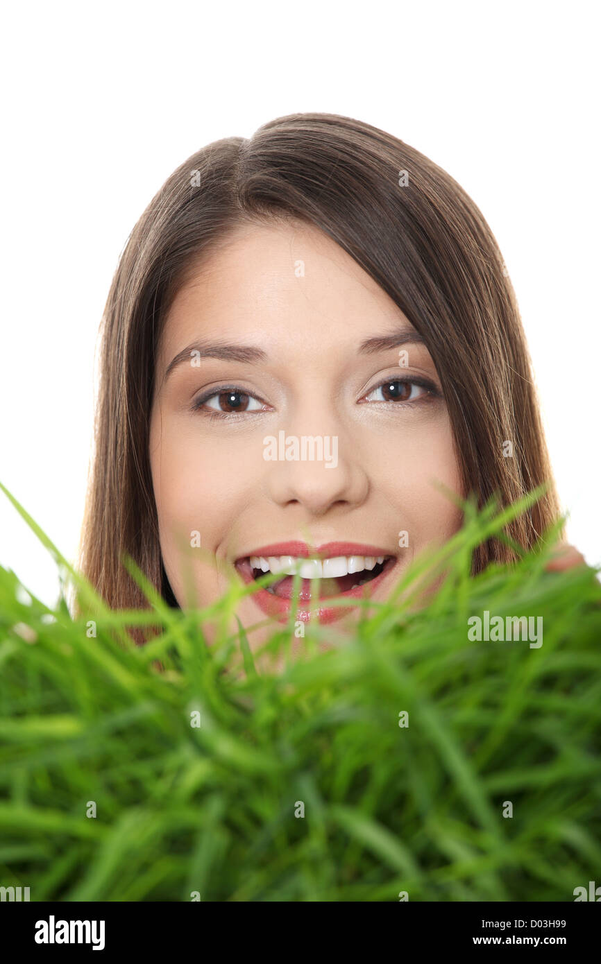 Beautiful young woman relaxing in the grass Stock Photo - Alamy
