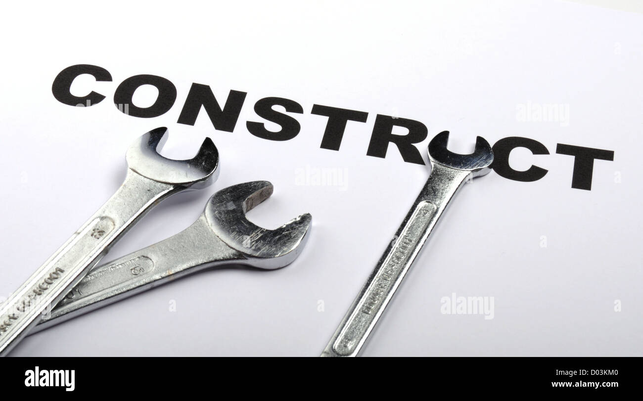 construct or construction concept with tool and word Stock Photo