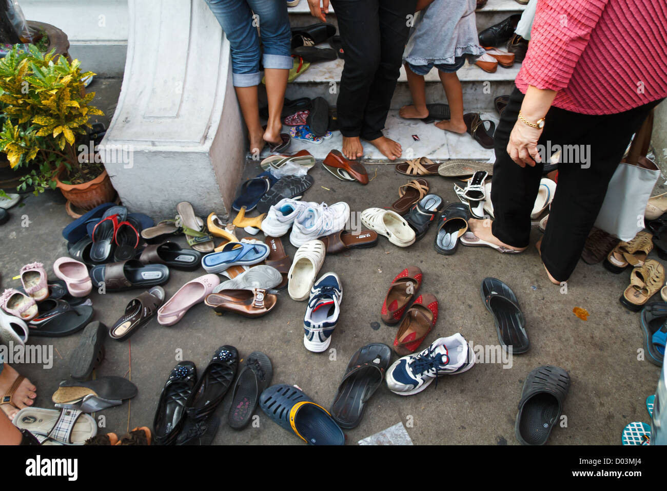 Shoes in front of a Buddhist Temple in Bangkok, Thailand Stock Photo Alamy