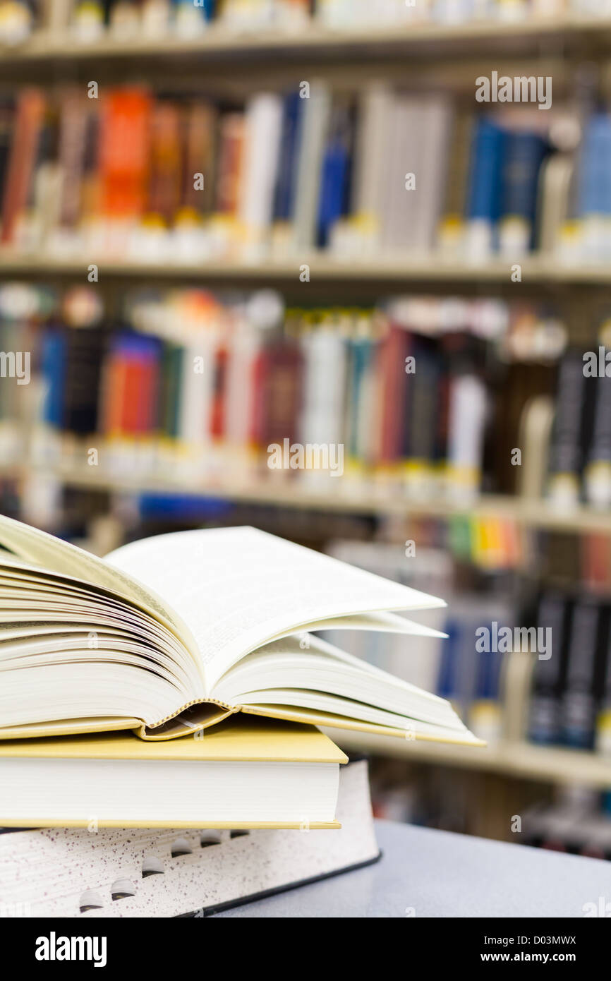Books and textbooks shown in a school setting / library setting (book binders are custom made, not copyright) Stock Photo