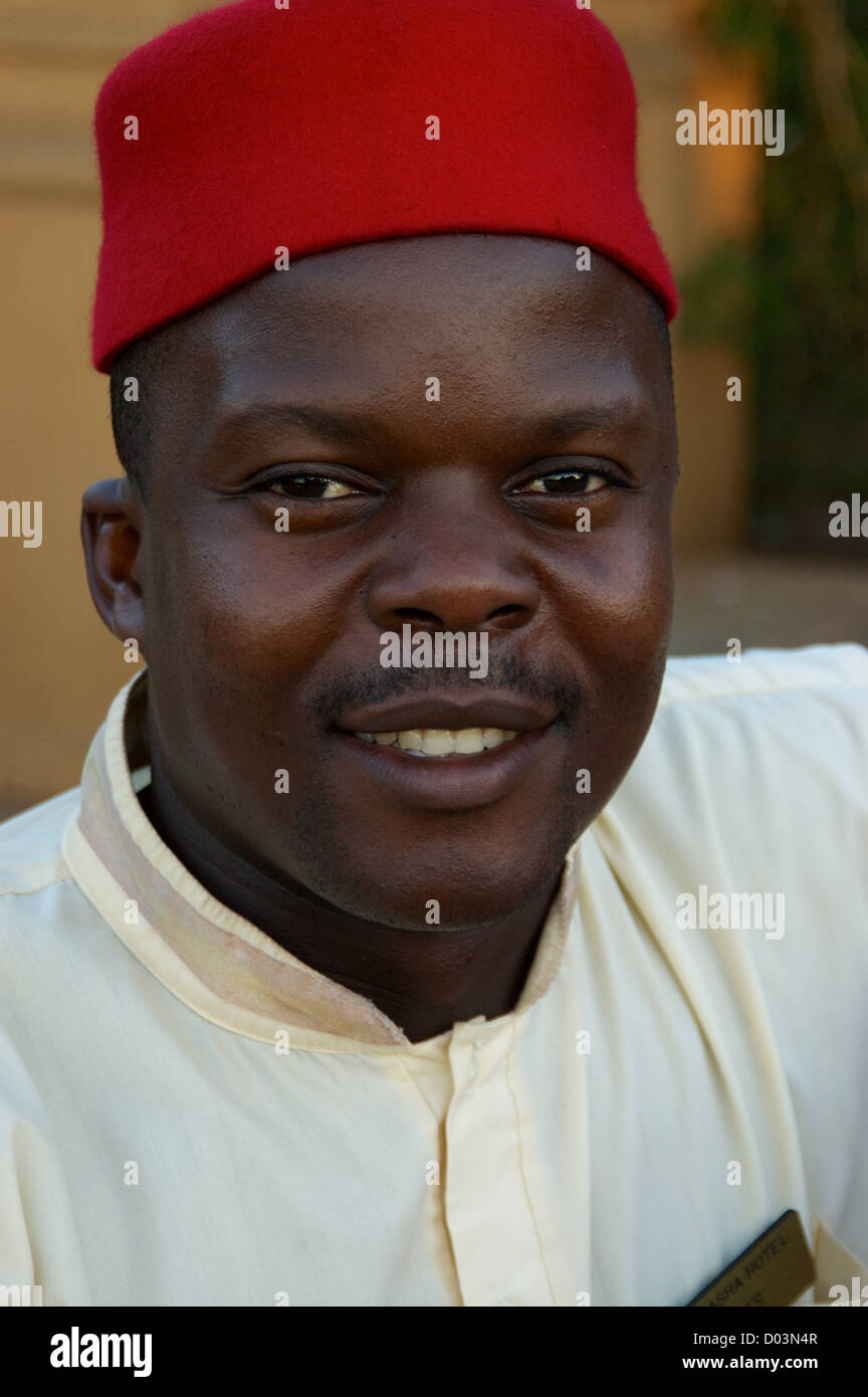 Portrait of a man, who's working at the Emin Pasha Hotel. Uganda, Africa Stock Photo