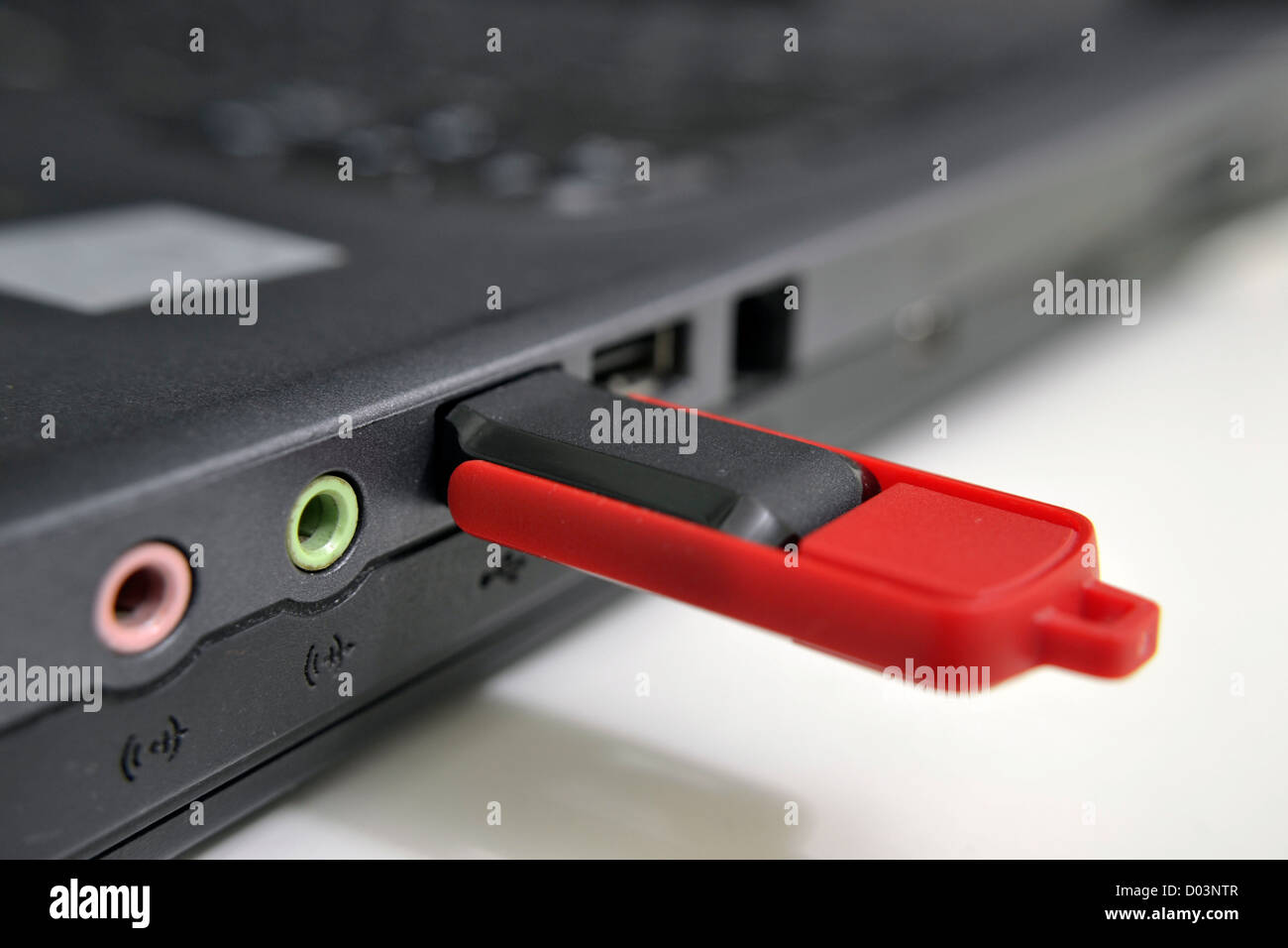 Flash drive hook to laptop Stock Photo