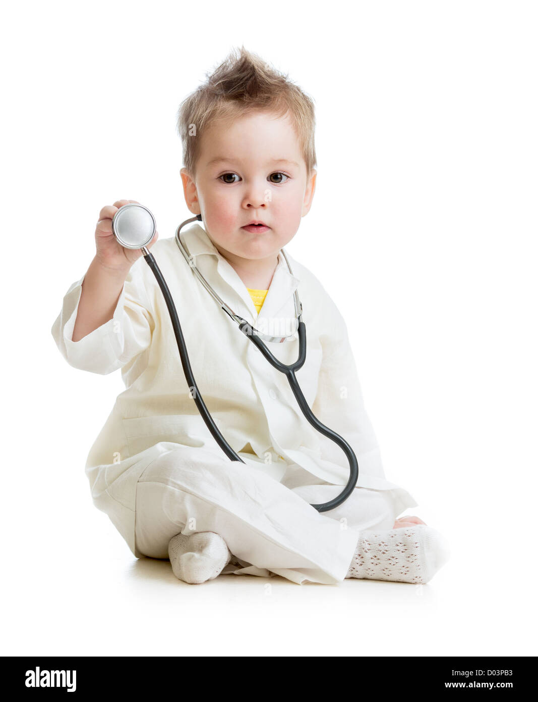 kid or child playing doctor with stethoscope isolated Stock Photo