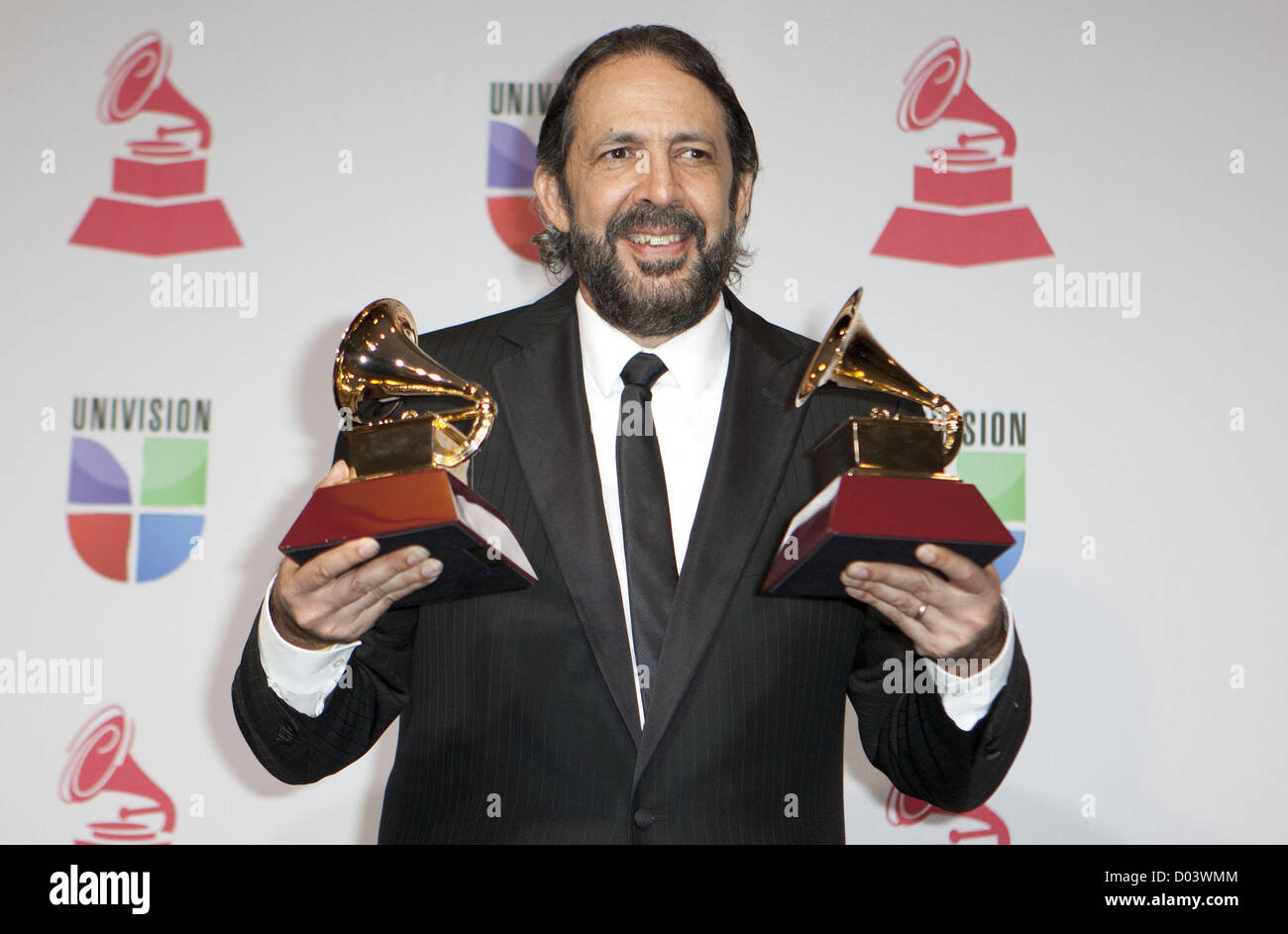 Nov. 15, 2012 - Las Vegas, Nevada, USA - Singer/producer Juan Luis Guerra poses with the awards for Producer of the Year and Album of the Year in the press room during the 2012 Latin Grammy Awards held  at Mandalay Bay in Las Vegas, Nevada on Thursday, November 15, 2012. (Credit Image: © Javier Rojas/Prensa Internacional/ZUMAPRESS.com) Stock Photo