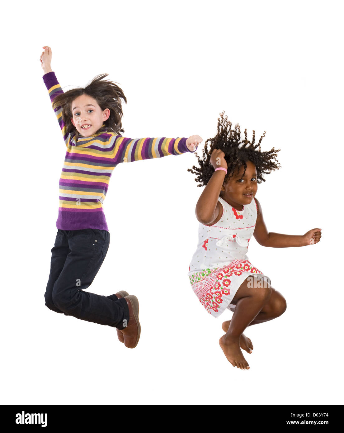 Two happy children jumping at once on a white background Stock Photo ...