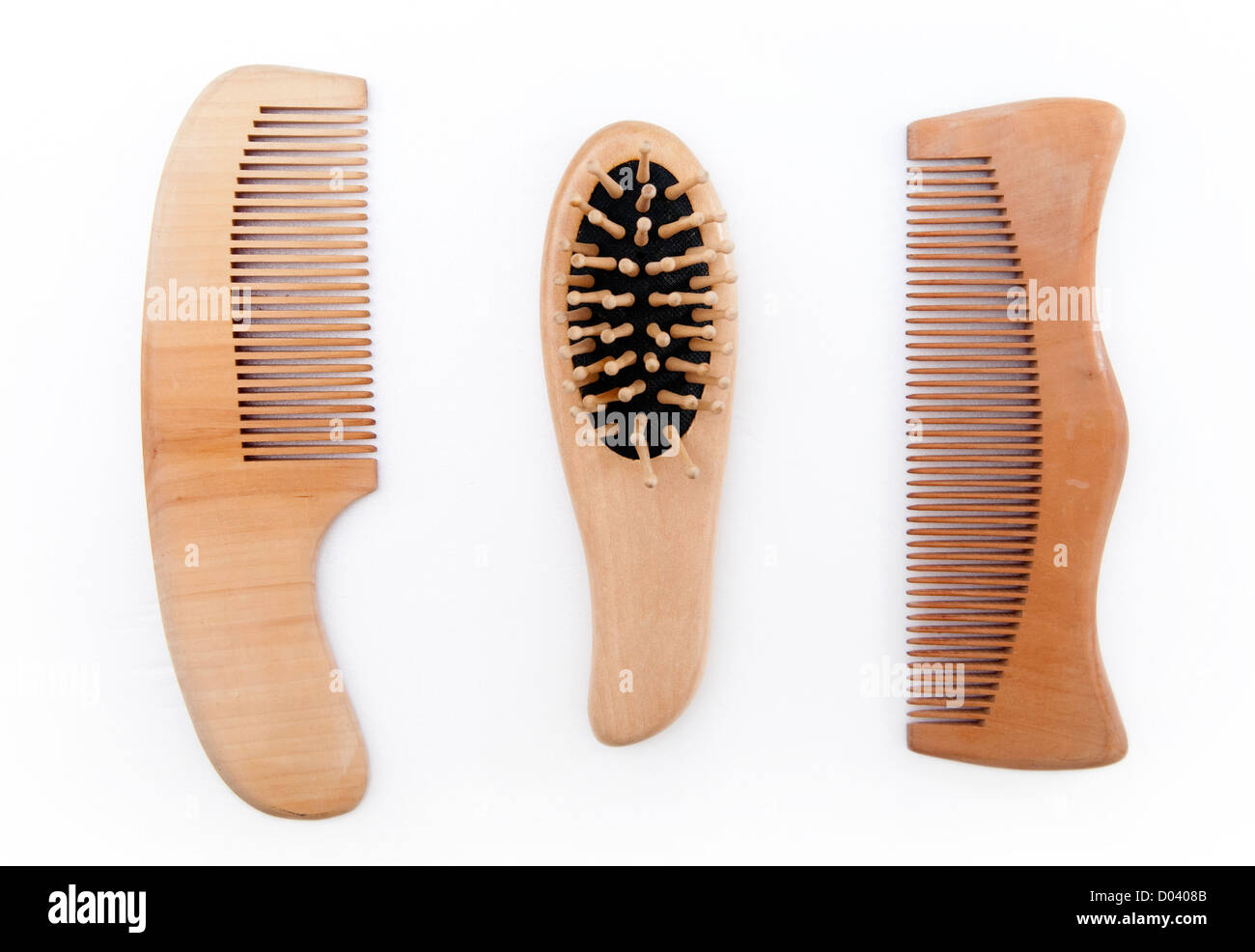 Wooden comb for hair on plain background. Stock Photo