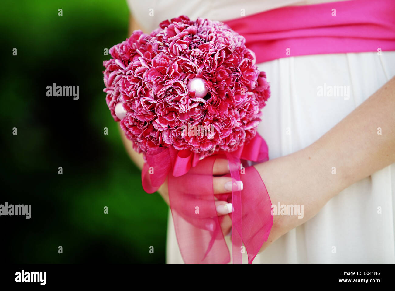 Beautiful bridal bouquet in hands Stock Photo