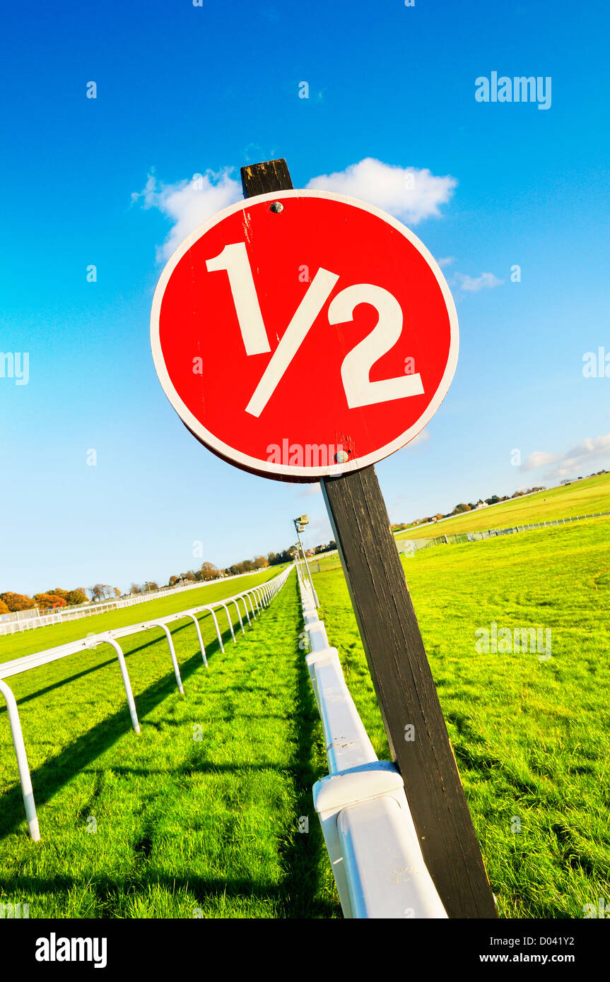 Furlong marker on Epsom Downs racecourse, Surrey, England, UK Stock Photo