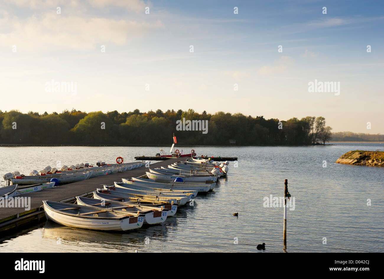 Boats dinghies moored on Hanningfield Reservoir in Essex. Stock Photo