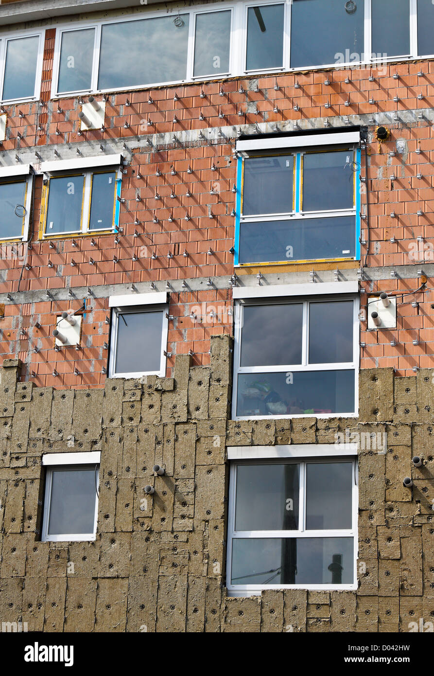 Good insulation in new residential building shell Stock Photo - Alamy