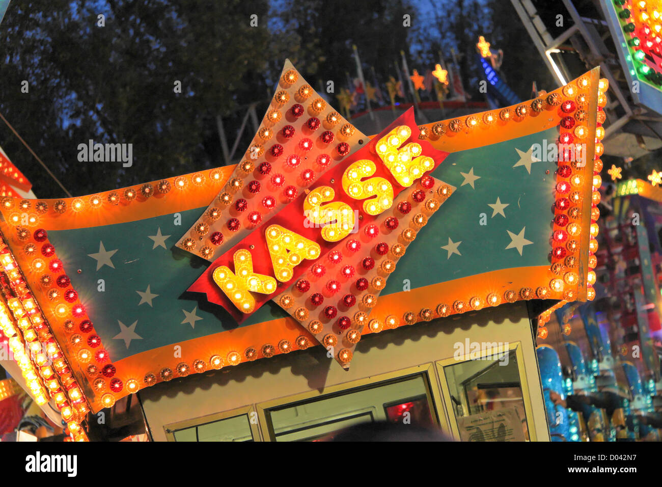 Cashier in an amusement park Stock Photo Alamy