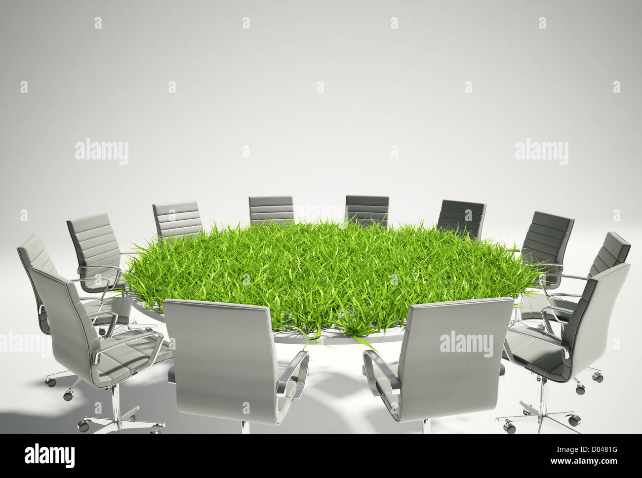 Conference table covered with grass - business outlook concept Stock Photo