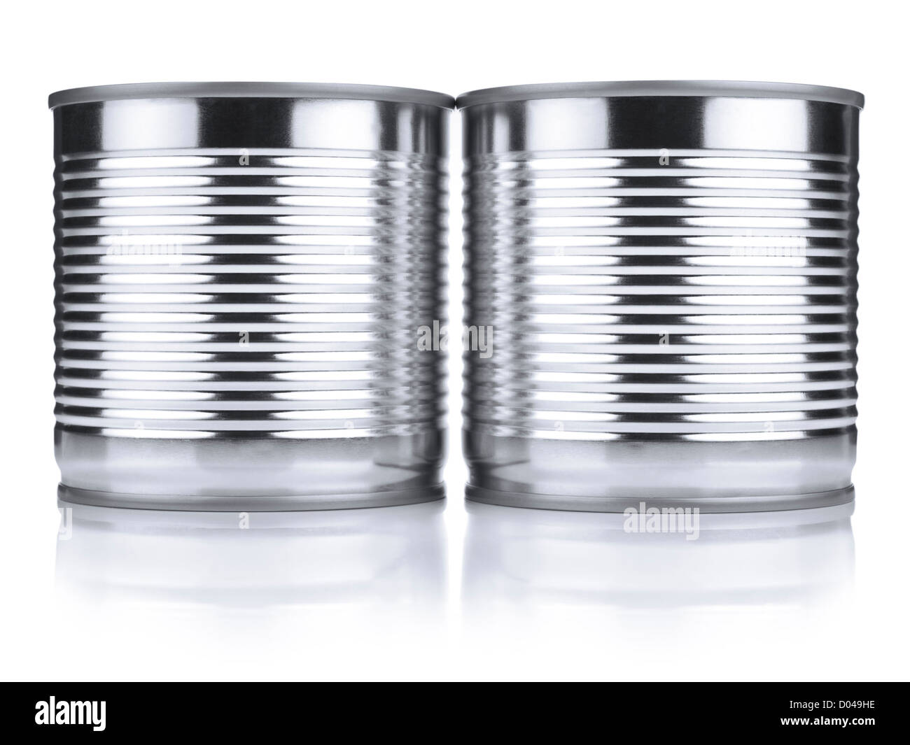 Two identical tin cans isolated on white. Stock Photo