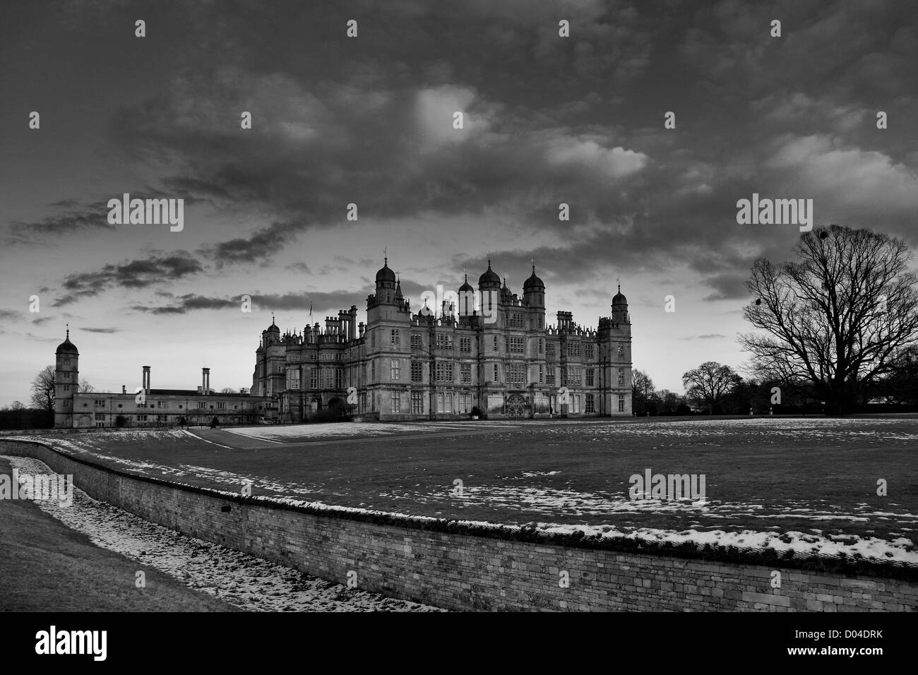 Late winter sunset over the west elevation of the Elizabethan Stately Home of Burghley House, Cambridgeshire, England; Britain Stock Photo