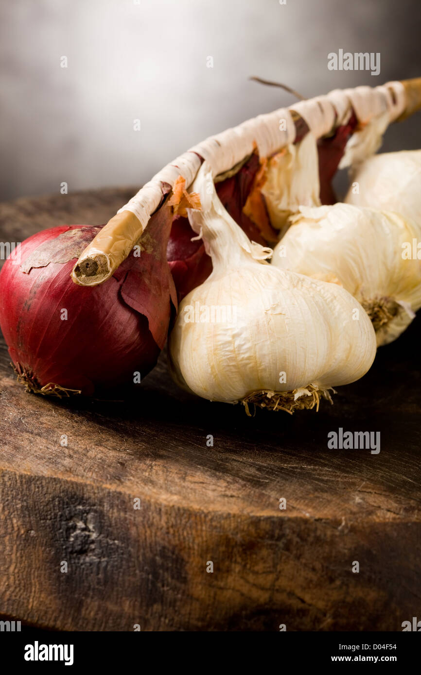 Onion on wooden table hi-res stock photography and images - Alamy