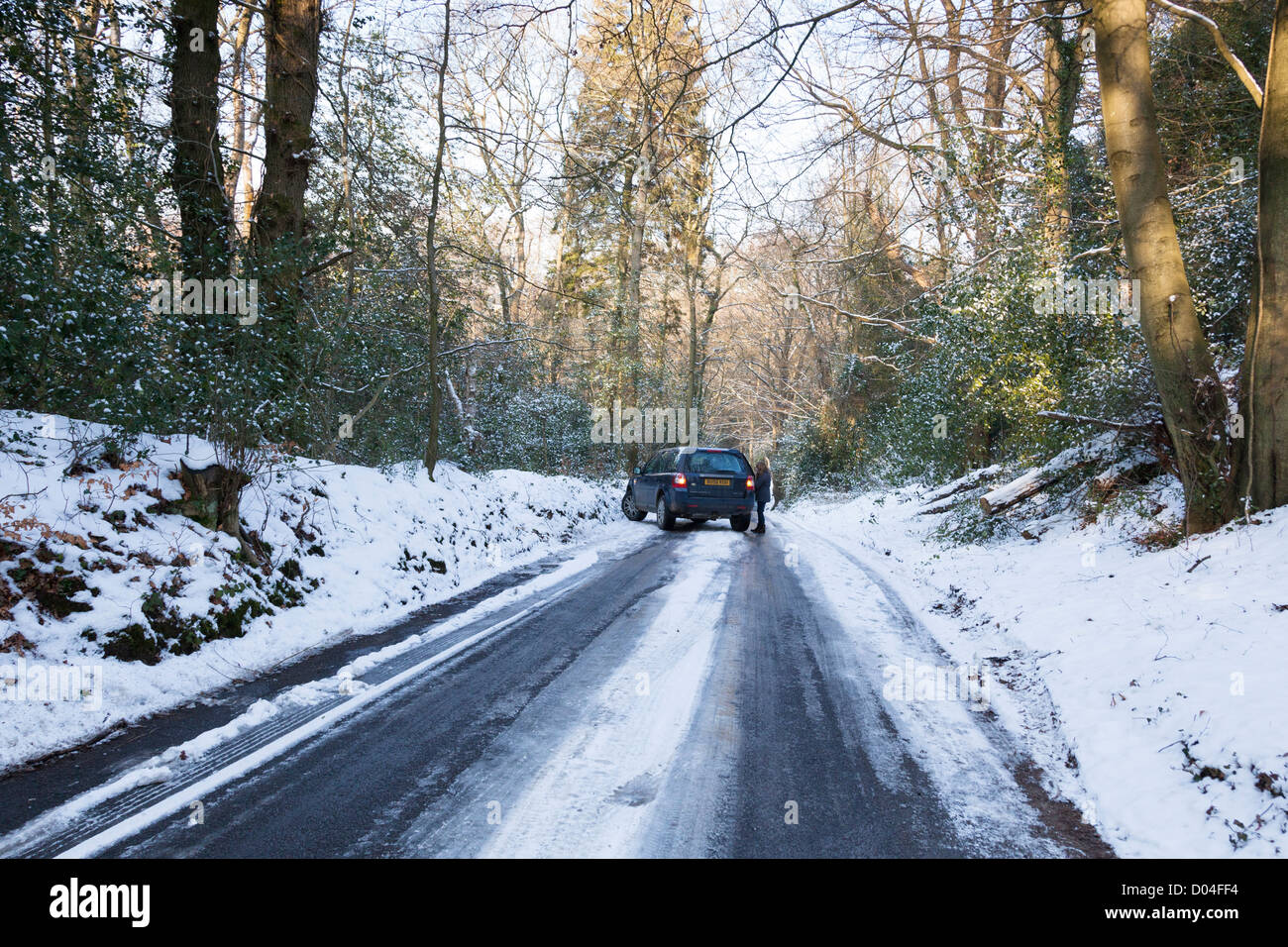 4 wheel drive car unable to descend a hill on an icy snow covered