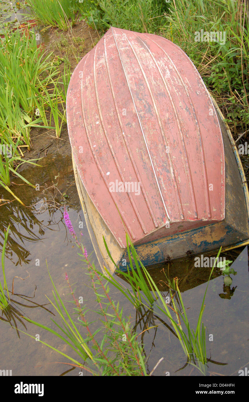 Upturned rowing boat in Greenwich Ecology Park in London, England Stock Photo