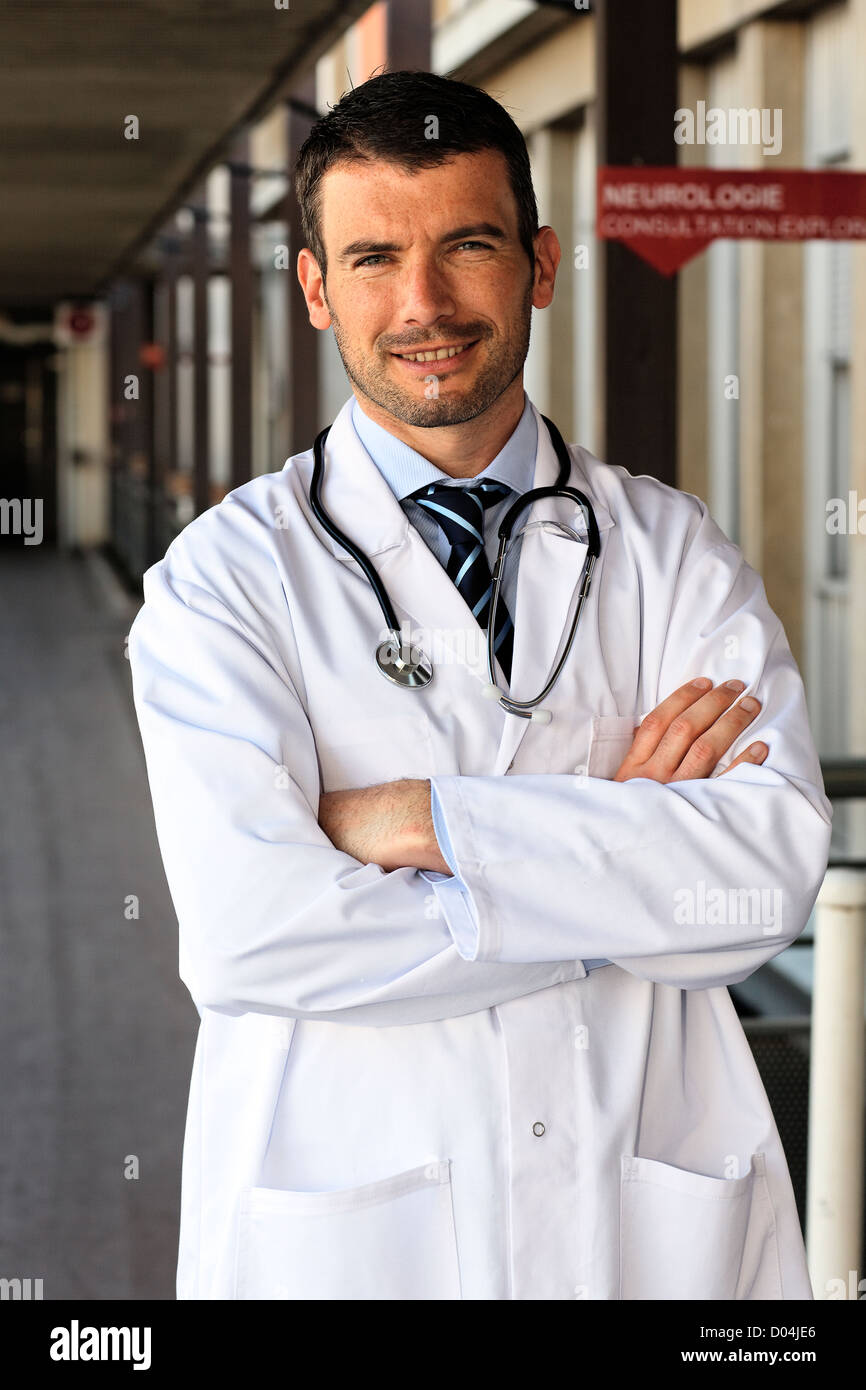 Doctor with smock and tie hi-res stock photography and images - Alamy