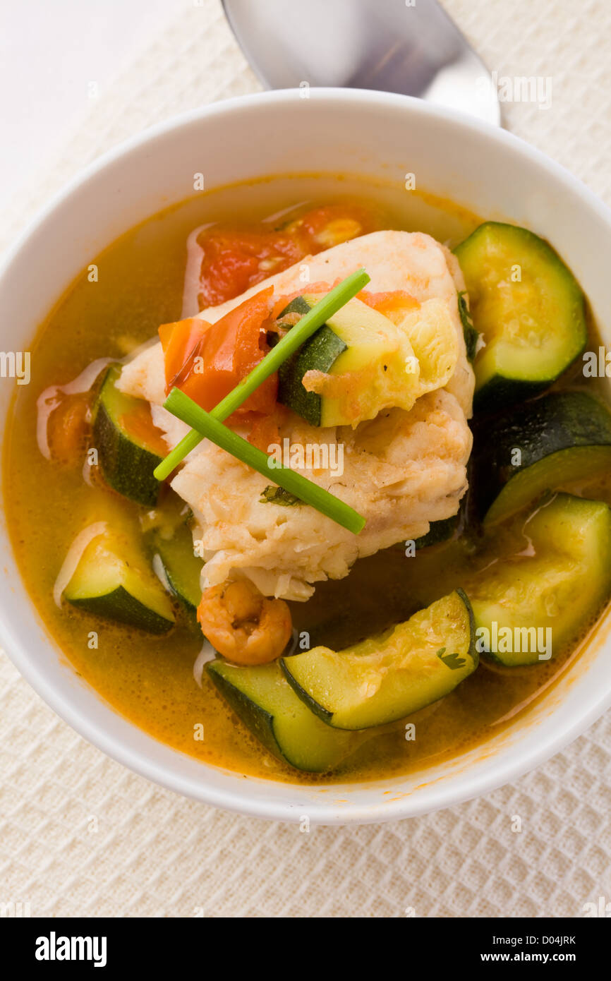 photo of delicious fish soup with cod and zucchini Stock Photo Alamy