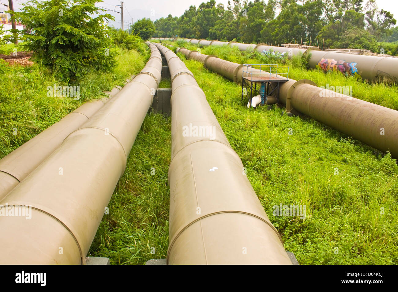 Industrial pipelines on the ground Stock Photo