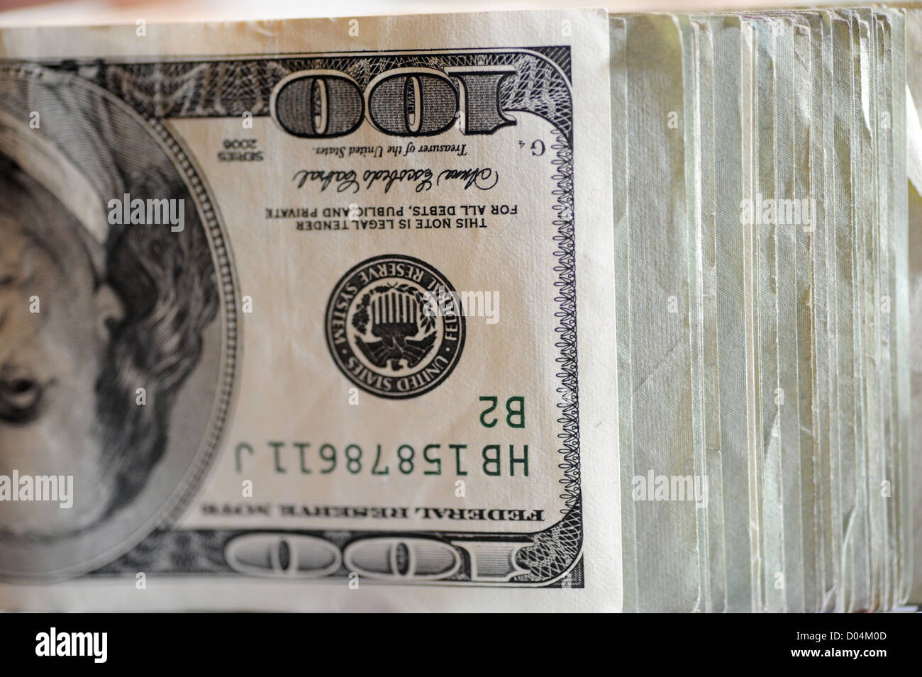 Stack of one hundred dollar bills Stock Photo