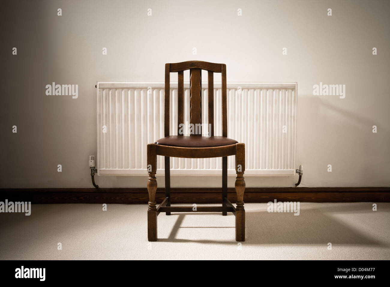 Chair and radiator Stock Photo - Alamy