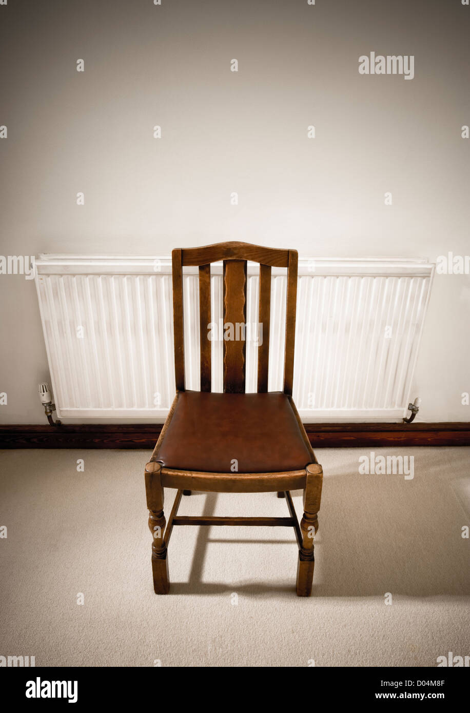 Chair and radiator Stock Photo - Alamy