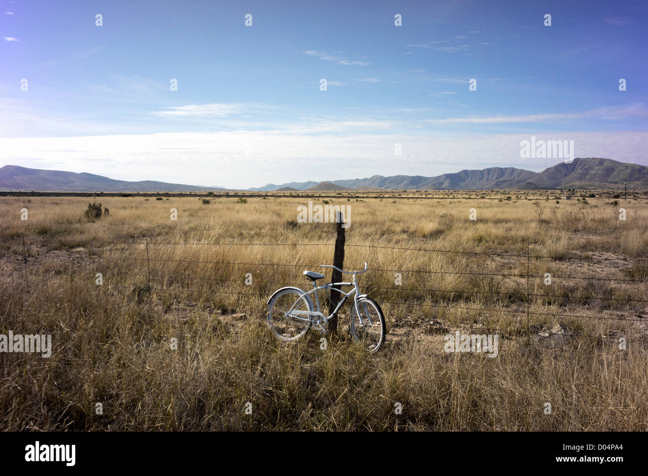 White bicycle called a White Ghost Bike, symbol of a cyclist death in the USA, near Marathon, Texas Stock Photo