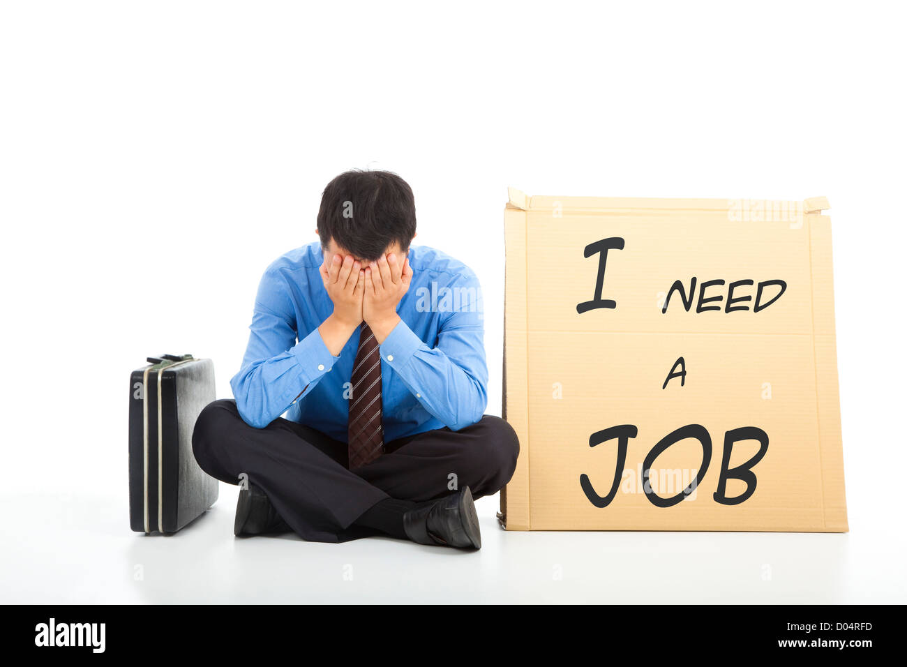 Depressed businessman looking for a job Stock Photo Alamy