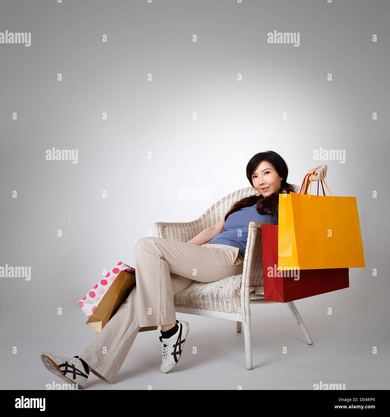 Woman sitting chair full length hi-res stock photography and images - Alamy