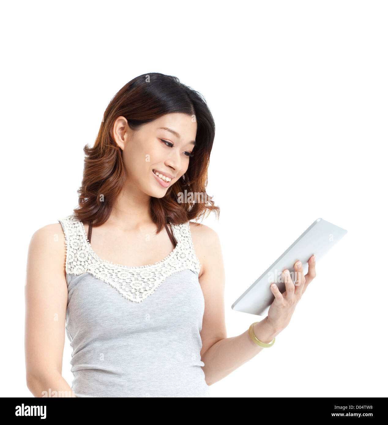 smiling asian young woman watching the tablet pc Stock Photo - Alamy