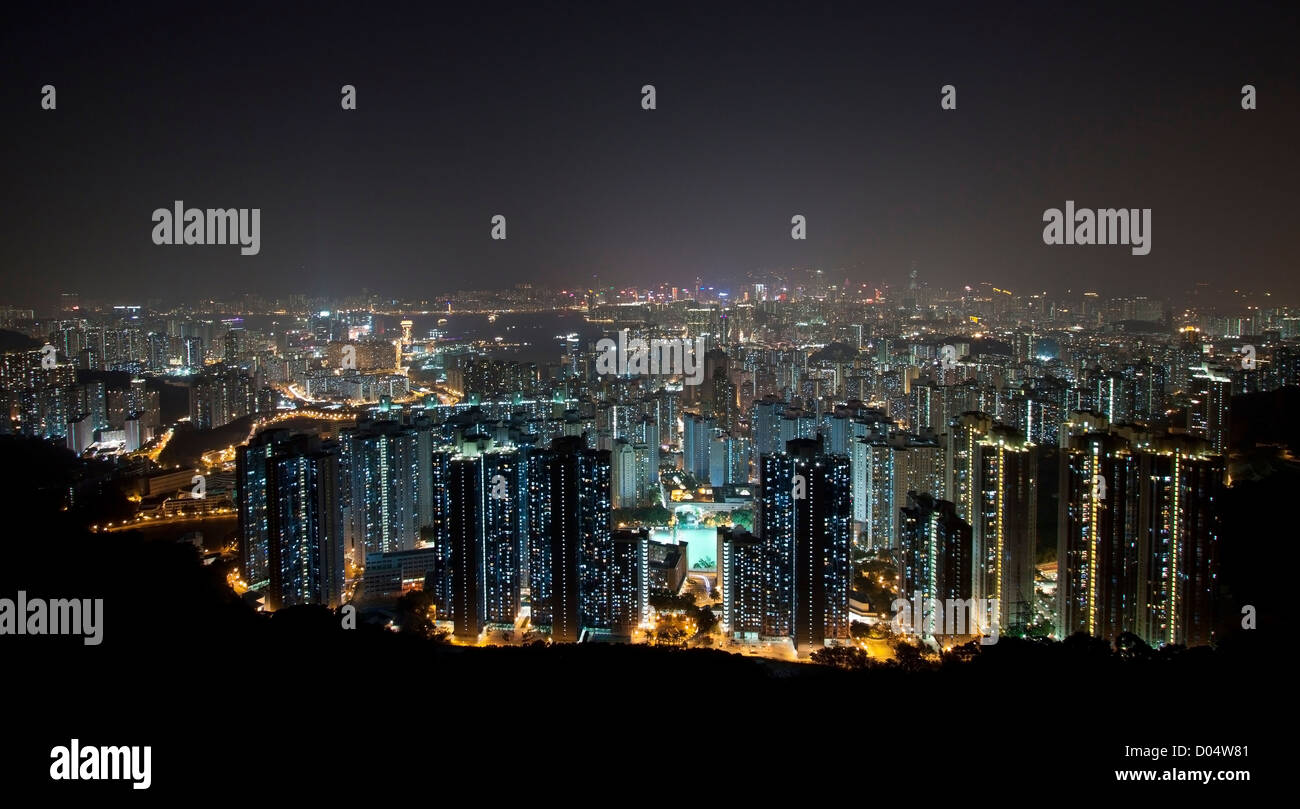 Hong Kong downtown at night with highrise buildings Stock Photo - Alamy