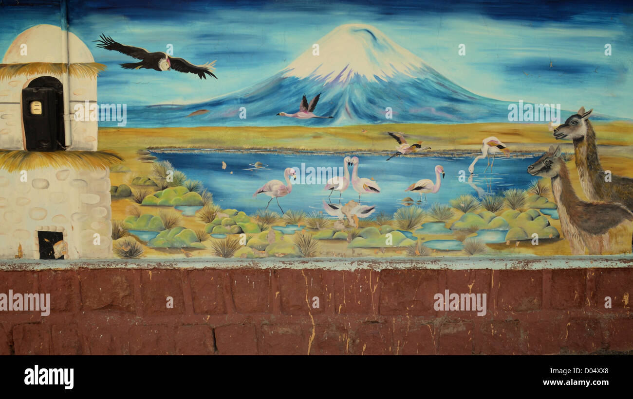 Mural depicting Andean life on a wall in the town of Putre, near Lauca National Park, Chile Stock Photo