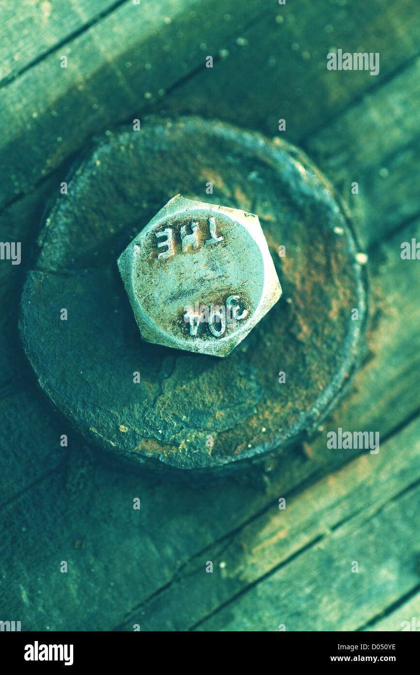 a small screw but big responsibility Stock Photo