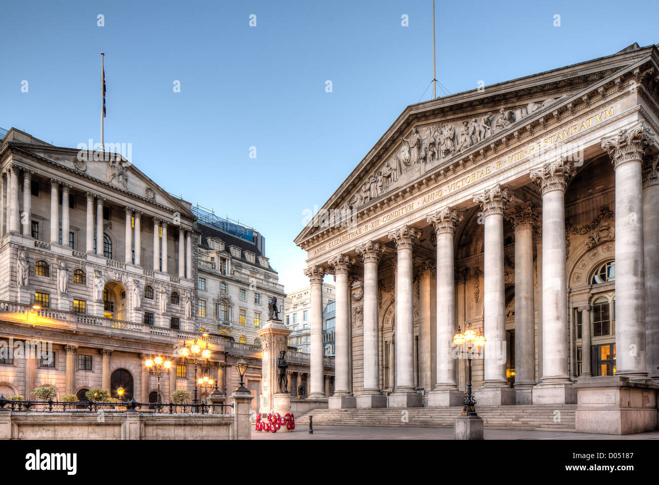 Bank of England and the Royal Exchange in London with street lights on Stock Photo