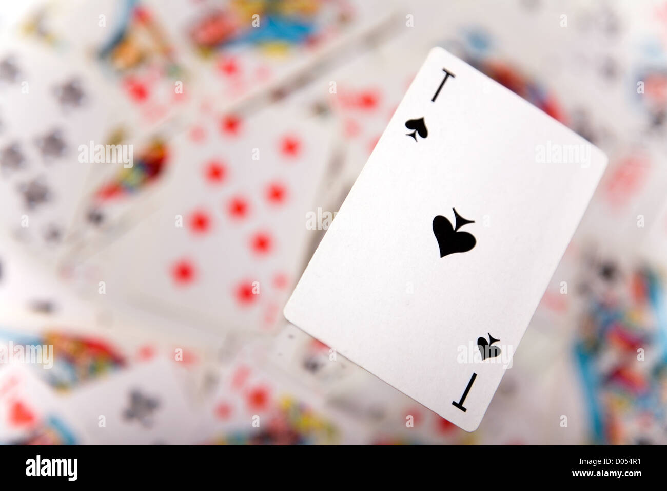 Closeup up of a spades ace over blurred card background Stock Photo