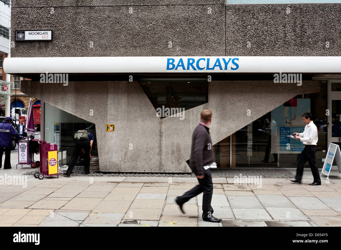 People Walking In City District London In Front Of Barclays Bank