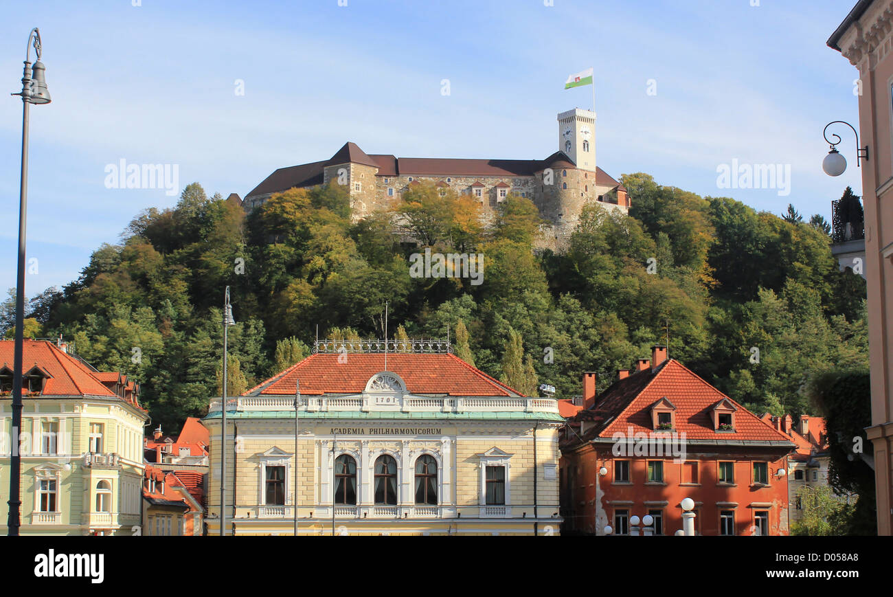 Philharmonic Hall and castle of Ljubljana, Congress square, Ljubljana, Slovenia Stock Photo