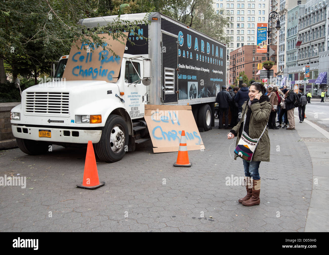 People lining up to charge their cell phones in Union Square after