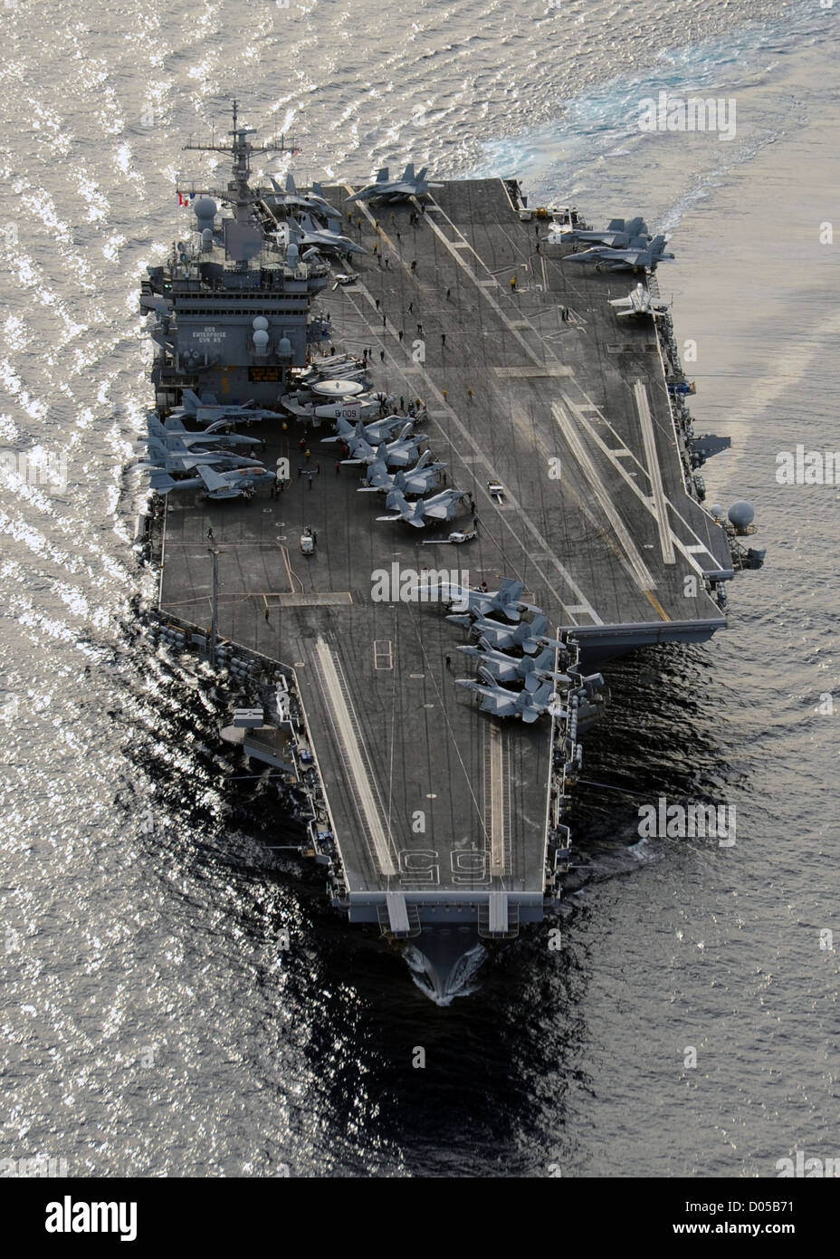 The aircraft carrier USS Enterprise is underway in the Atlantic Ocean January 25, 2012 during a composite training unit exercise. Stock Photo