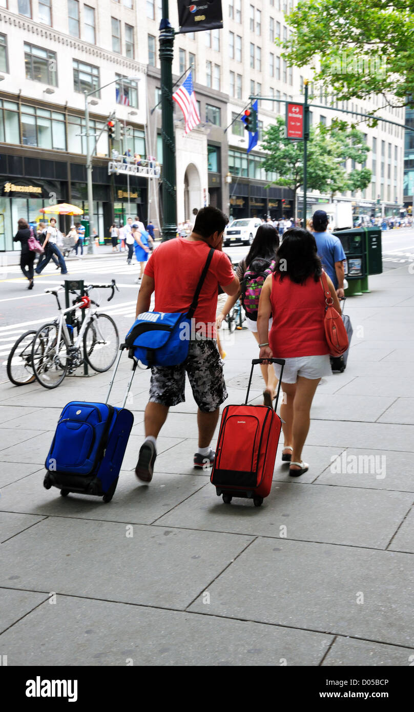 Tourists with luggage, New York, USA Stock Photo Alamy