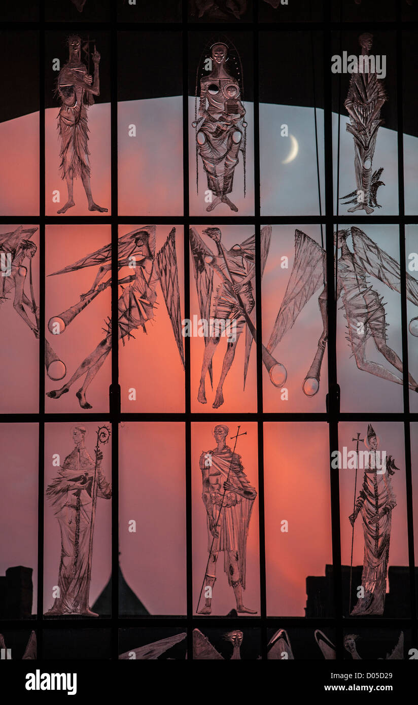 Evening sunset with a new crescent moon seen through the West Screen at Coventry Cathedral, West Midlands, UK. Stock Photo