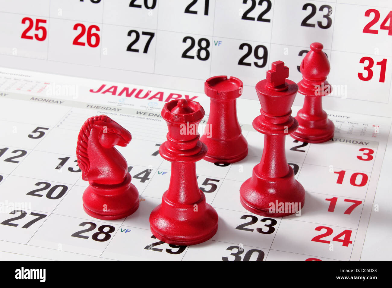 Chess Pieces on Calendar Stock Photo