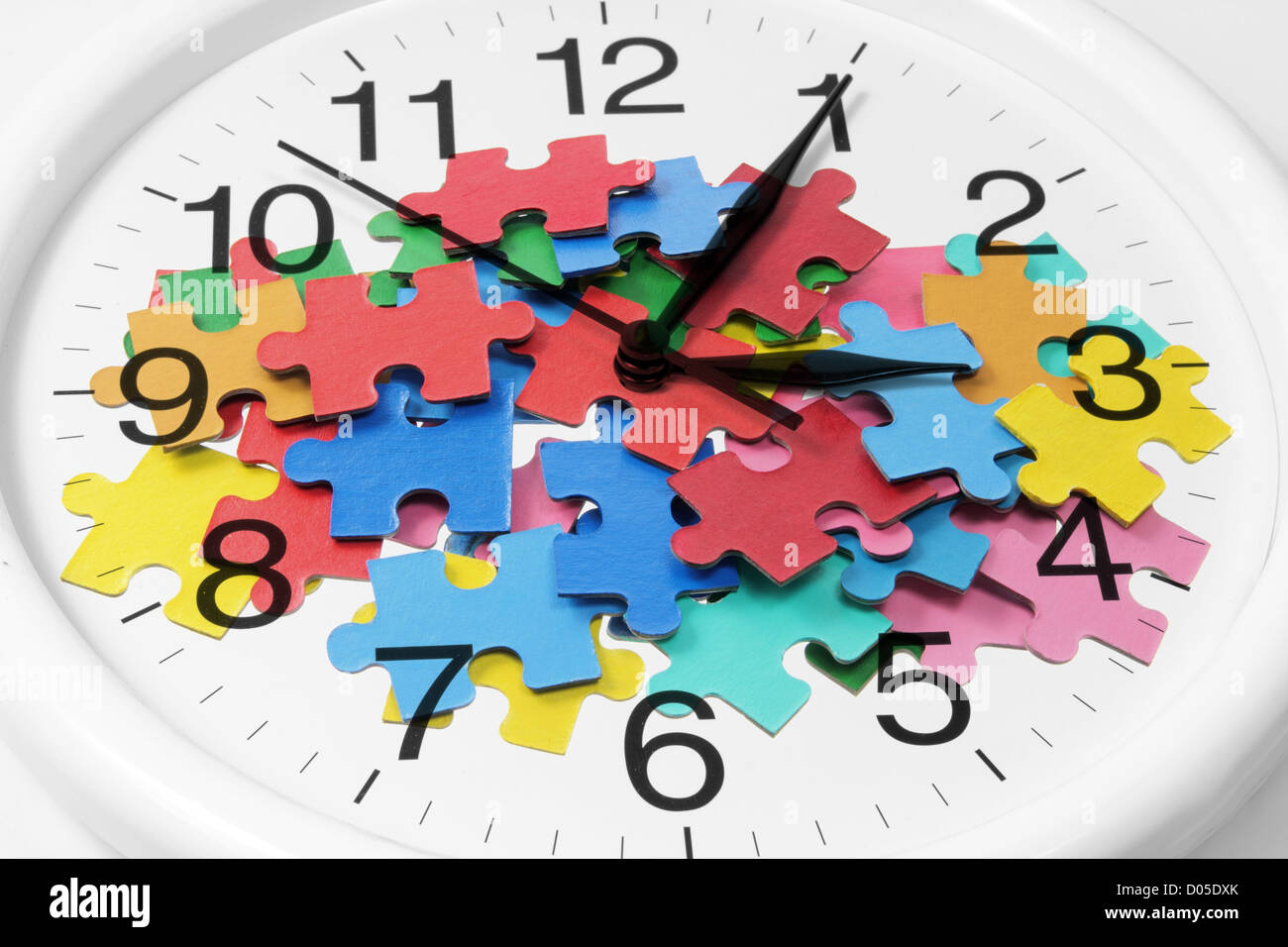 Clock and Jigsaw Puzzle Pieces Stock Photo Alamy
